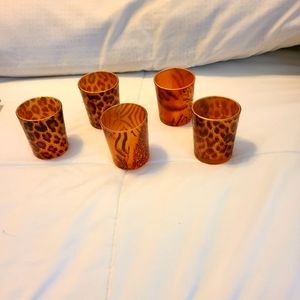 Leopard votive candle holders.